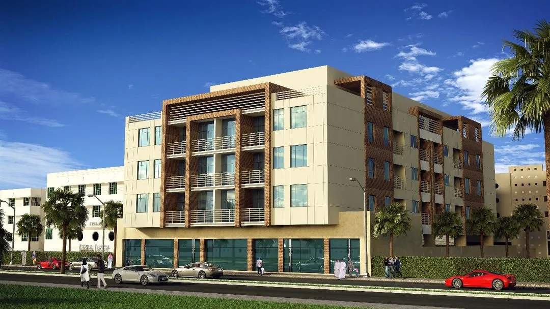 Image of a building with a parked car, under clear blue skies.